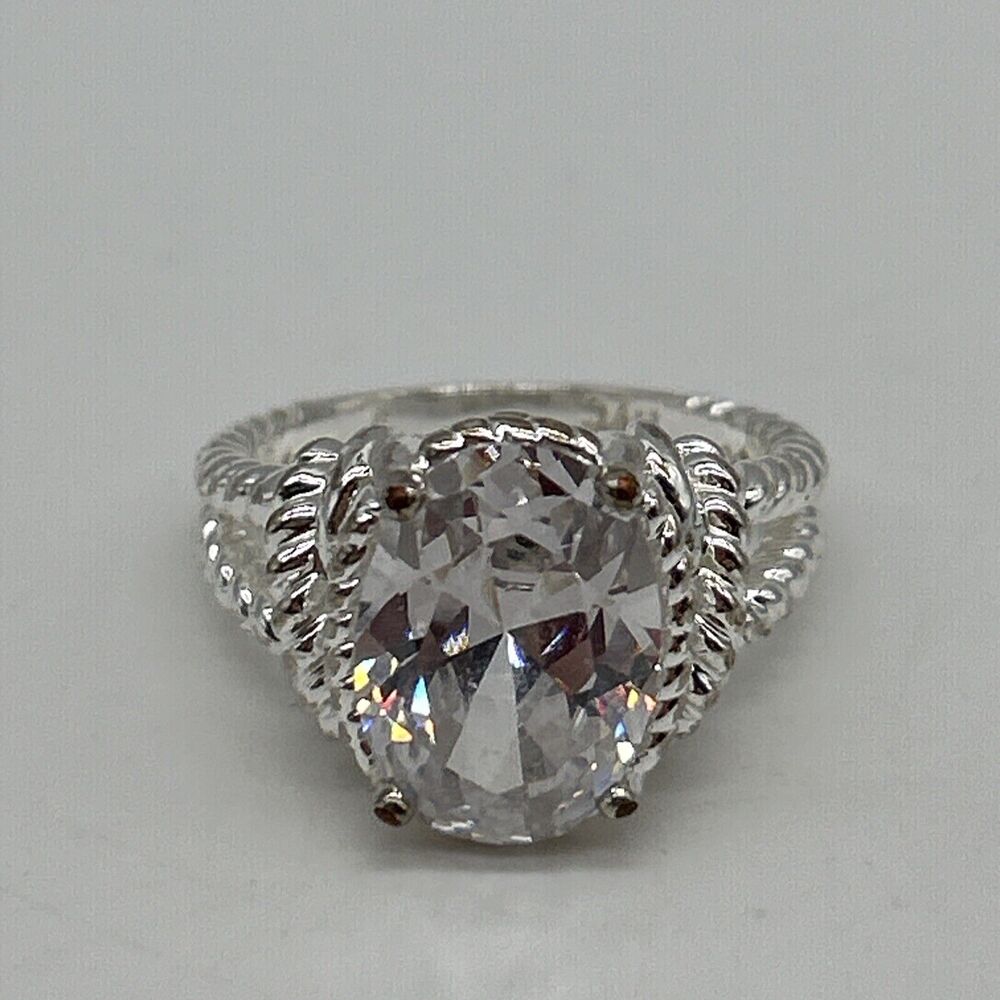 Avon NVC Clear Crystal Ring Size 9 Oval Stone Silver Tone Rope Band